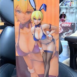 Blonde Anime Figure with Blue Outfit and Bunny Ears